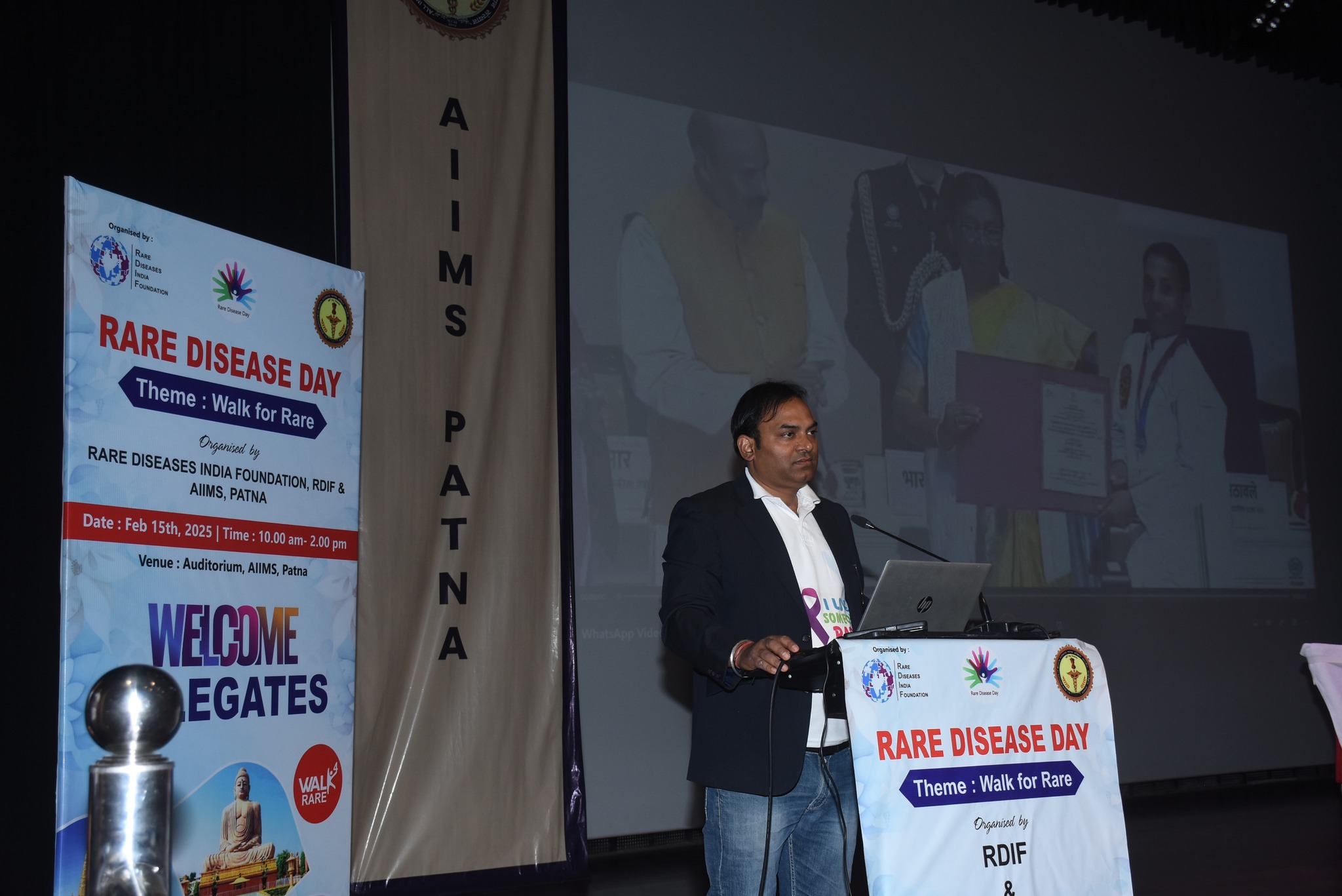 Volunteers at an information desk during the event in Patna.